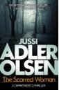 perfume a suspenseful and suspenseful novel of cat and mouse contest between the weak detective and the cold faced devil Adler-Olsen Jussi The Scarred Woman
