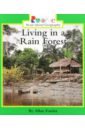 цена Fowler Allan Living in a Rain Forest